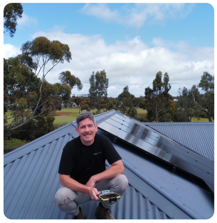 Cameron Pike, Evo Solar founder, on a rooftop installation